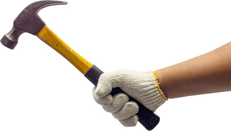 The hand hold the hammer isolatedの写真素材