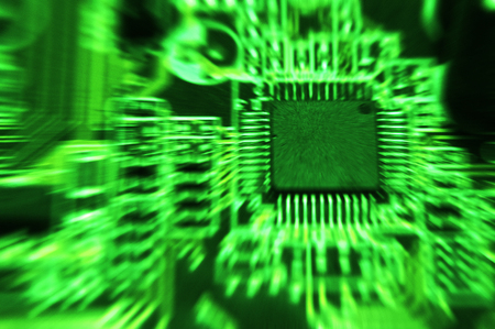 closeup of electronic circuit board with processor background