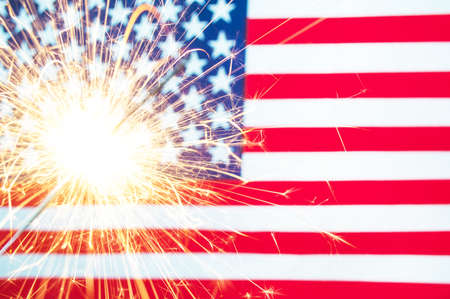 4 of july concept with sparkler and usa flagの写真素材