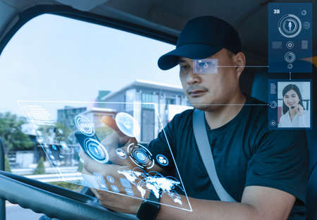 Asian man using smartphones check data digital. High-tech truck driver Find location 3D world map...