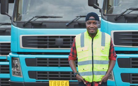 portrait African American men happy Smiling confident positive standing near lorry. Young Man owner...