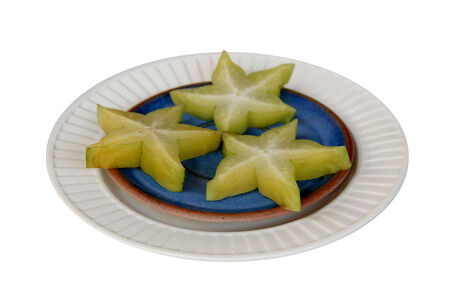 Starfruits on platesの写真素材