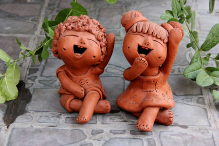 Smiling ceramic kidsの写真素材