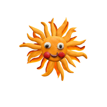 Plasticine  sun face sculpture isolatedの写真素材