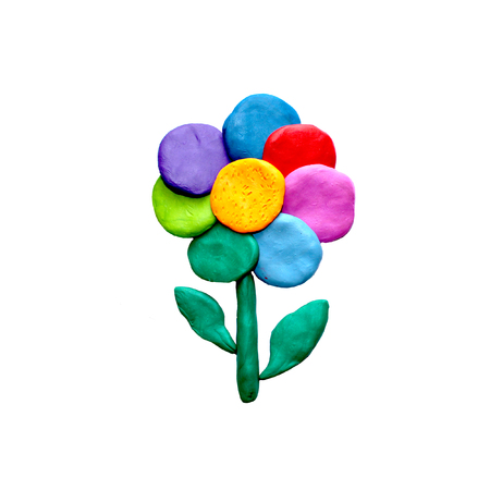 Plasticine  rainbow flower isolated on white backgroundの写真素材