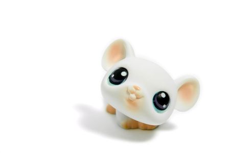 cute toy mouse with big eyes, isolated on whiteの写真素材