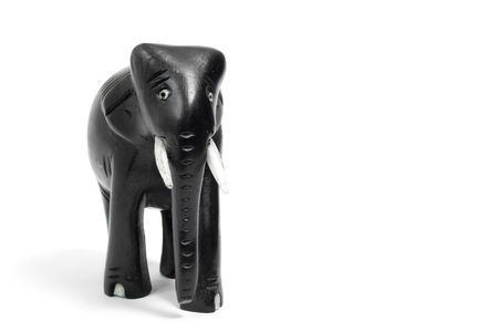 wooden toy elephant, isolated on whiteの写真素材