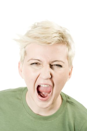 Young woman screaming, isolated on white background.の写真素材