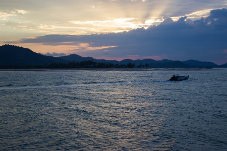 Boats on a background of a sunset の写真素材