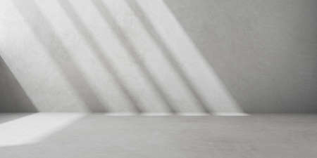 3d render of empty concrete room with shadow on the wall.の写真素材