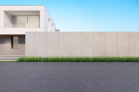 3d rendering of modern house with wall and empty concrete road.の写真素材