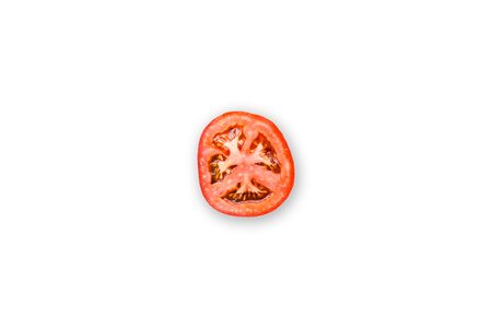 Slice tomato isolated on white backgroundの写真素材