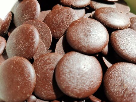 Dark chocolate is removed from the fridge, prepared for baking.の写真素材