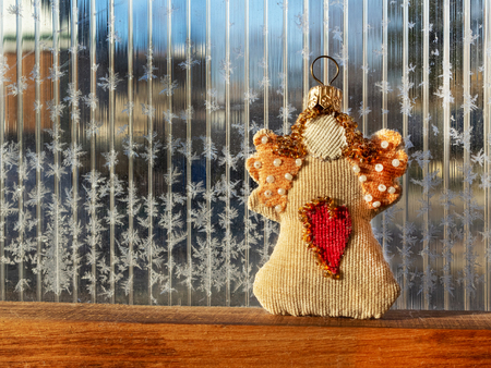 Angel handmade decoration on cardboardの写真素材