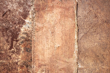 Metal rusty background texture, under corrosion paint with scratches, cracks, copy space,decorative texture for the design and place for the inscriptionの写真素材