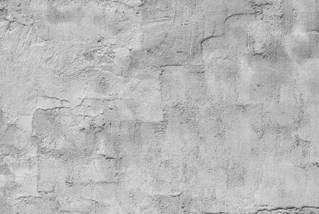 white and gray abstract textured plaster on the wallの写真素材