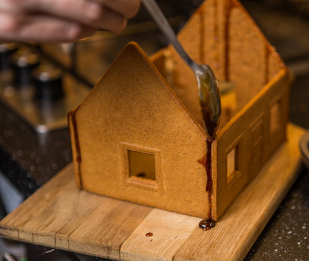 Homemade gingerbread house. Preparing for Christmas selebrationの写真素材
