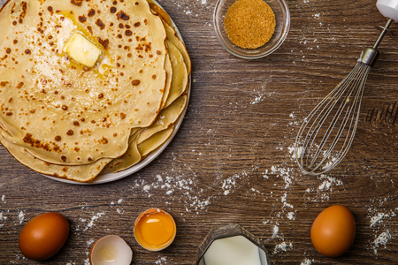 Pancakes on table with flourの写真素材