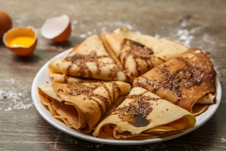 Hot pancakes with chocolate close-upの写真素材