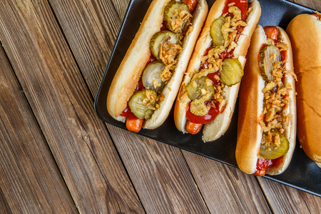 American hot dog with pickles,onions, ketchup and mustardの写真素材