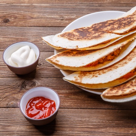 Quesadilla with meat and sauceの写真素材
