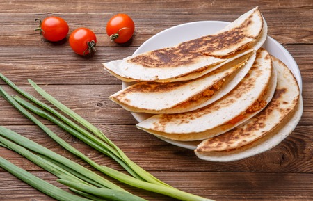 Tortilla with chicken and onionsの写真素材