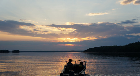 Picture of sunset on lakeの写真素材