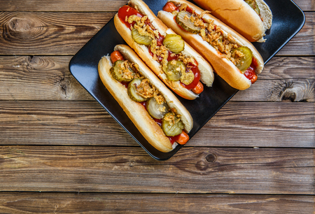 American hot dog with pickles,onions, ketchup and mustardの写真素材