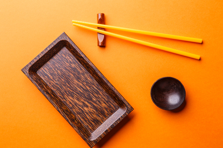 Sticks, plate on empty backgroundの写真素材