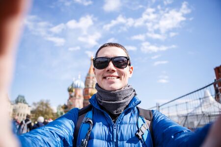 Cheerful man making selfieの写真素材