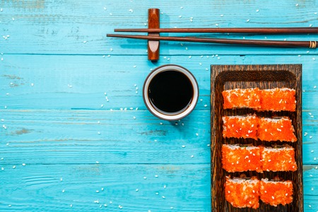 Rolls with caviar on boardの写真素材