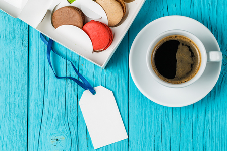 Coffee with macaroon on tableの写真素材