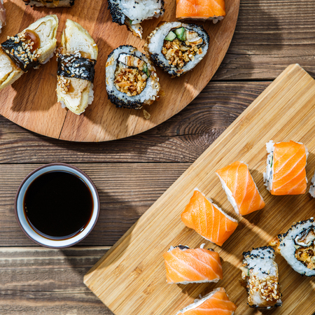 Sets of sushi on boardsの写真素材