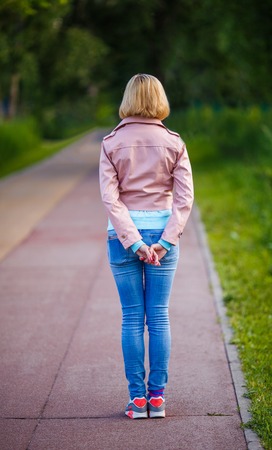Blonde from back in park
