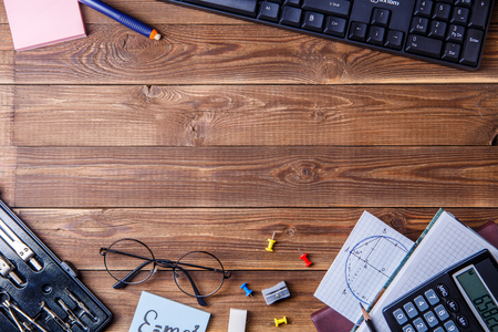 Student material on wooden table with copyspace.の写真素材