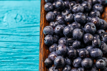Fresh blueberry in a bowl. Concept for healthy eating and nutritionの写真素材