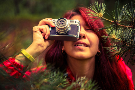 Image of woman with cameraの写真素材