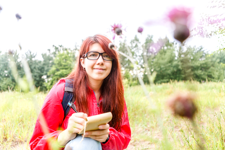 Photo of thistle and brunetteの写真素材