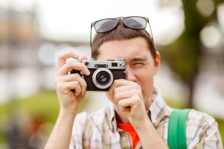Photo of man with camera