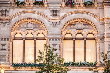 Picture of building with garlands and flowersの写真素材