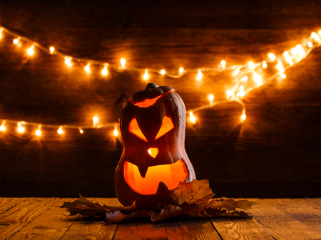 Photo of halloween pumpkin cut in shape of faceの写真素材