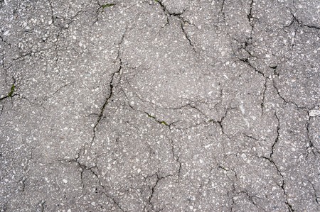 Gray asphalt in cracks.の写真素材
