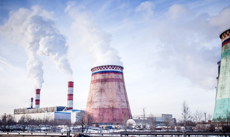 Photo of pipes with smoke, bridge, power stationの写真素材