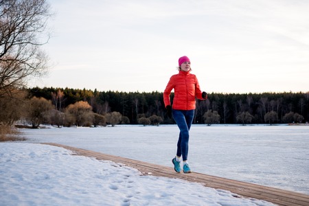 Image of sports girl on morning exercise in winterの写真素材