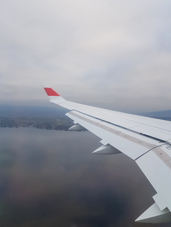 Earth, ocean and plane wingの写真素材