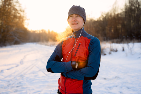 Portrait of a runner dressed in warm sportswearの写真素材