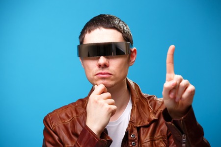 A man is using the glasses of virtual reality.の写真素材