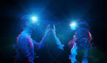 Couple in love communicate using a virtual reality headset. Image with glitch effect.の写真素材