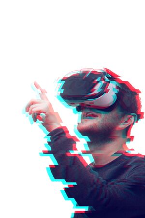 Man is using virtual reality headset on whiteの写真素材