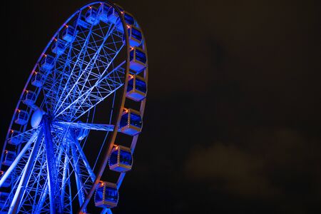 Picture of ferris wheel against background of night skyの写真素材